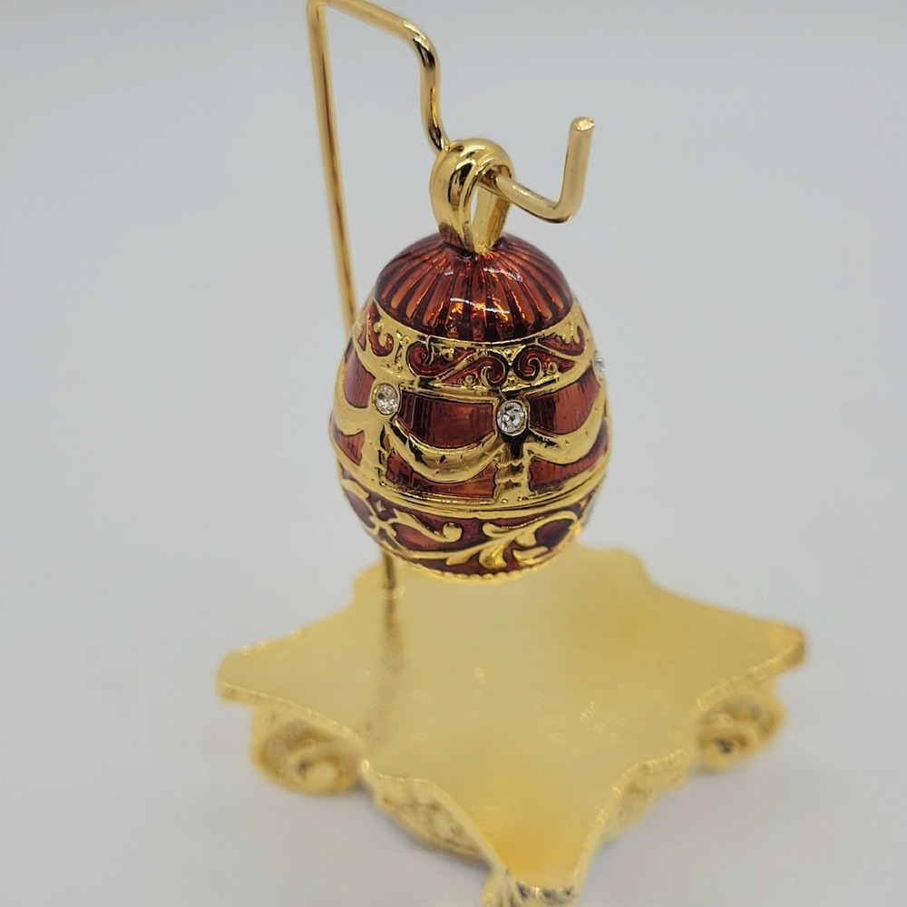 Vintage Joan Rivers Red Enamel Faberge Style Egg Pendant with Gold Stand